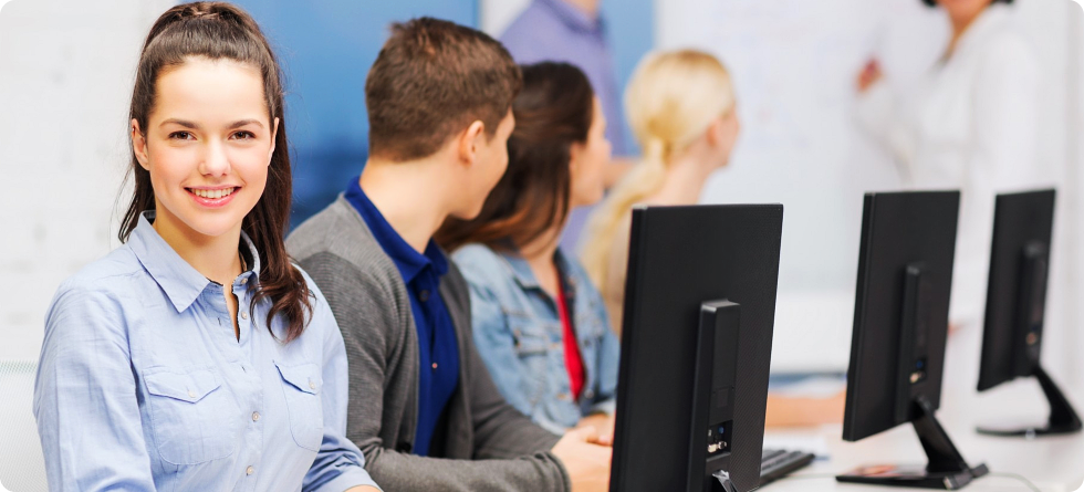 Trainee sitting in front of desktop